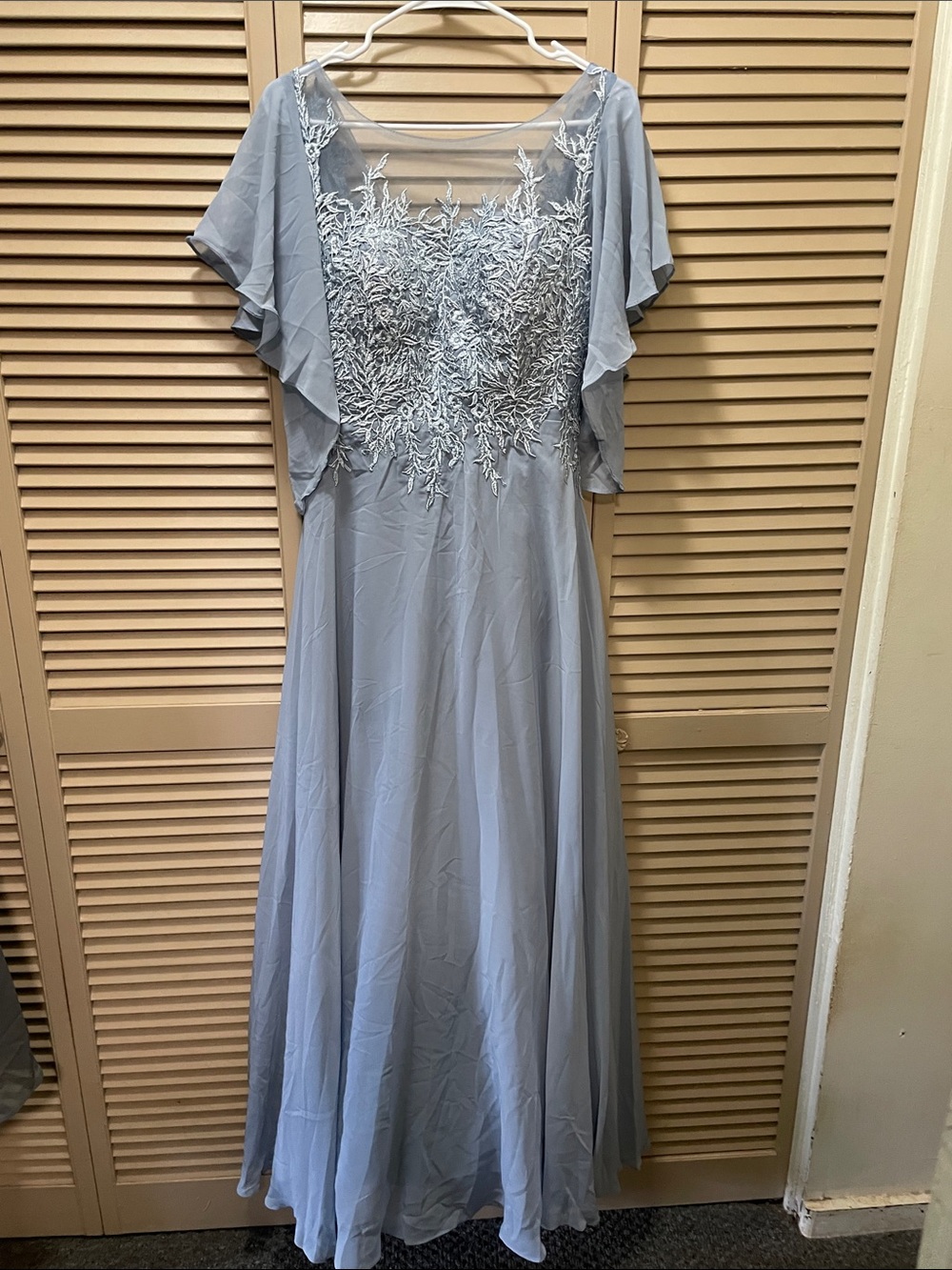 Elegant Light Blue Evening Dress with Embroidered Bodice
